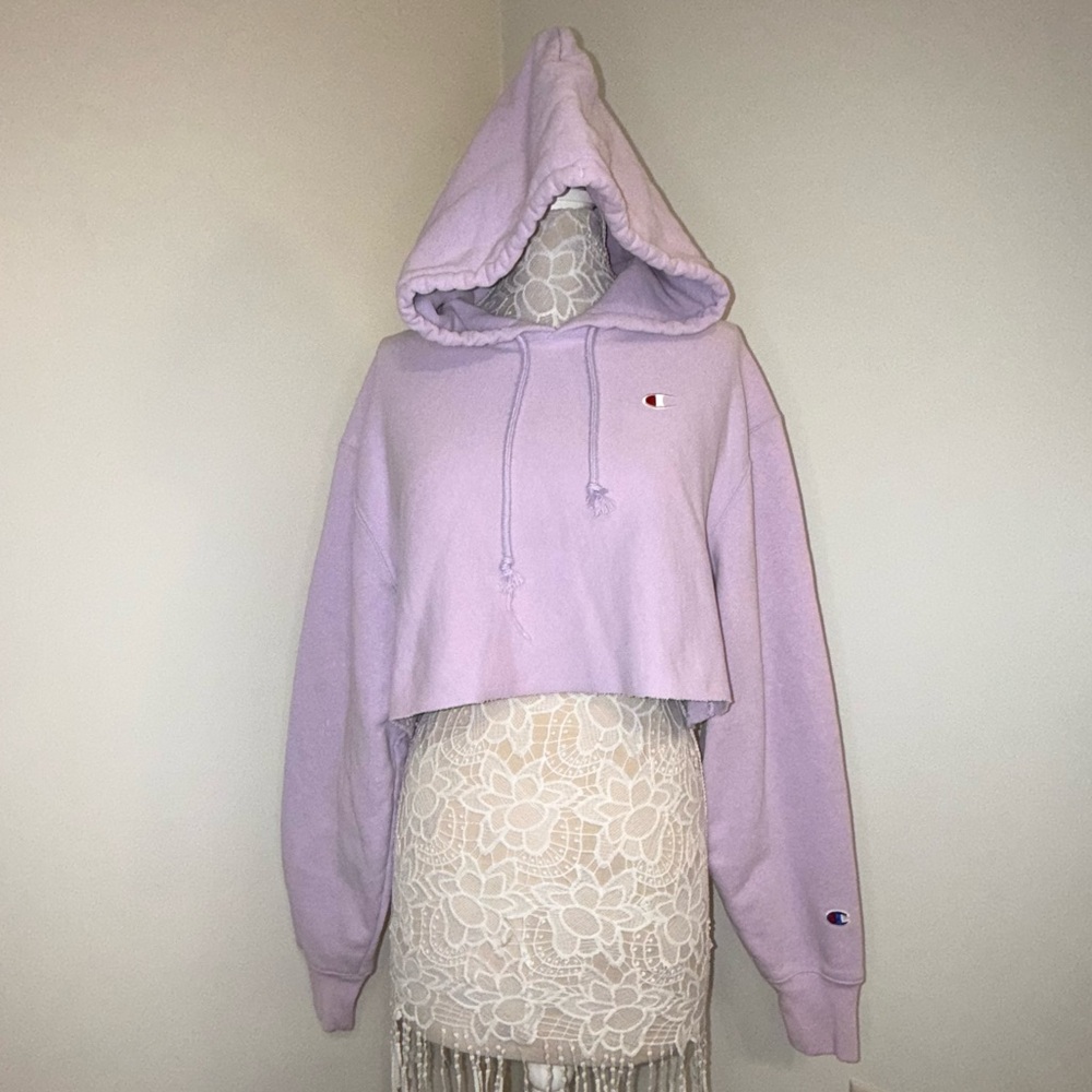 Large Champion Reverse Weave lilac colored cropped hoodie.